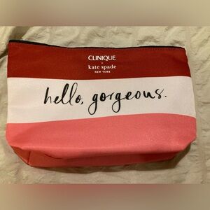 Kate spade pink red and white travel pouch